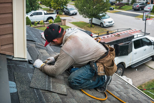 Professional Flat Roof Repair technician working in Hayes, VA